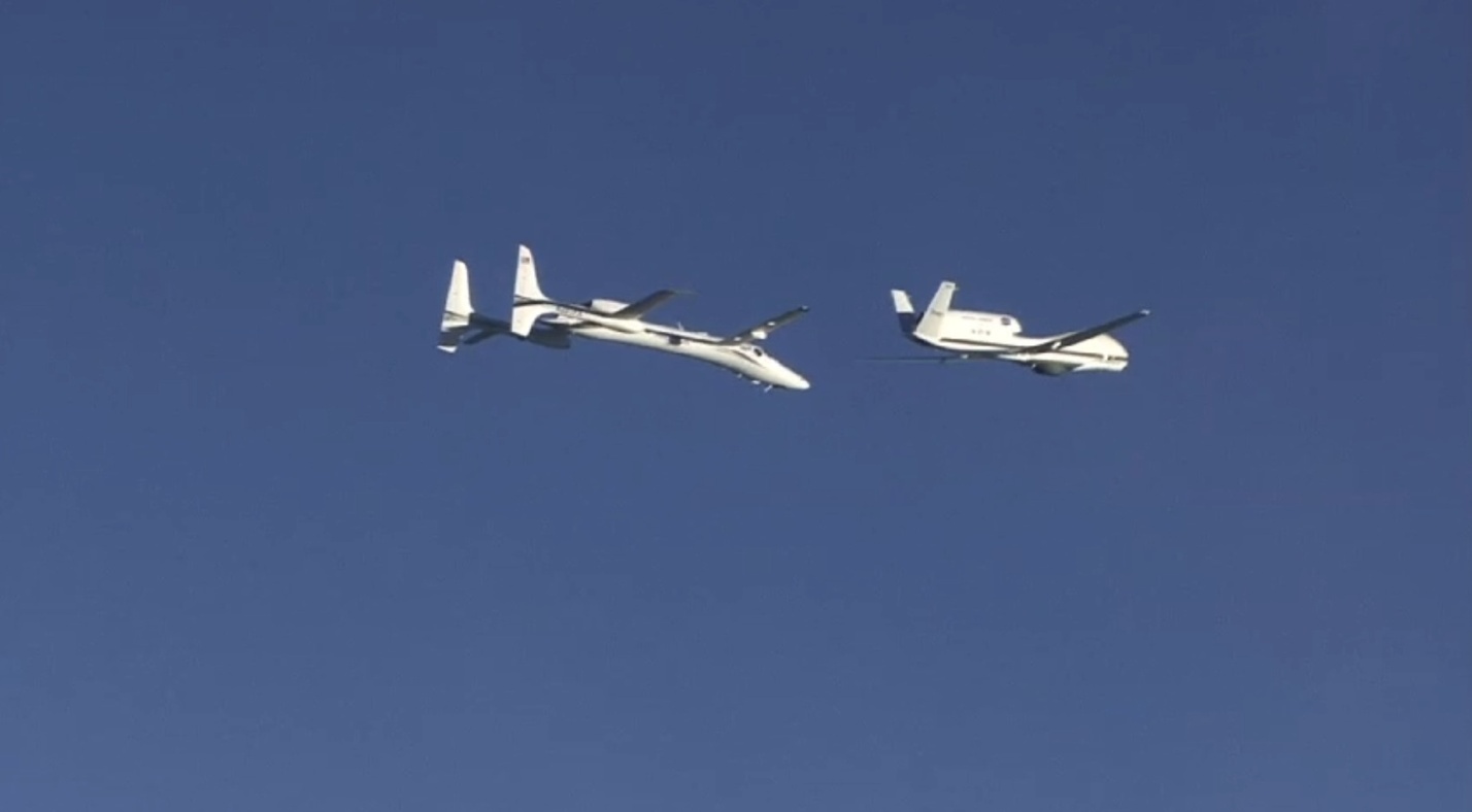 Northrop Grumman&#039;s Proteus test aircraft approaches a NASA Global Hawk during a flight from NASA Dryden Flight Research Center on Jan. 21, 2011 to study the wake turbulence from the NASA Global Hawk. 