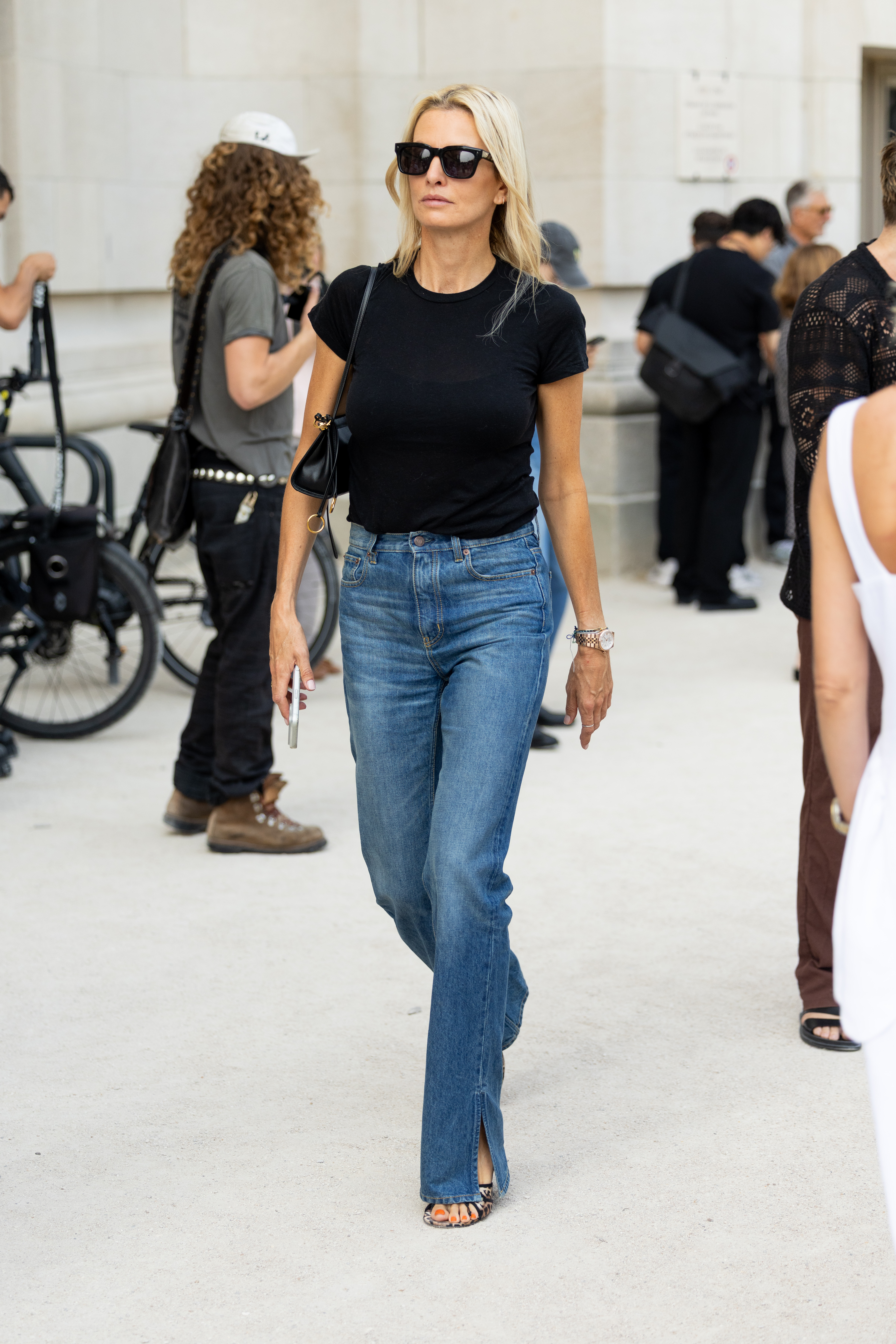 Woman wearing a Paris Haute Couture Week outfit.