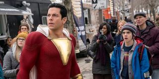 Shazam and Freddy looking in the distance at something concerning