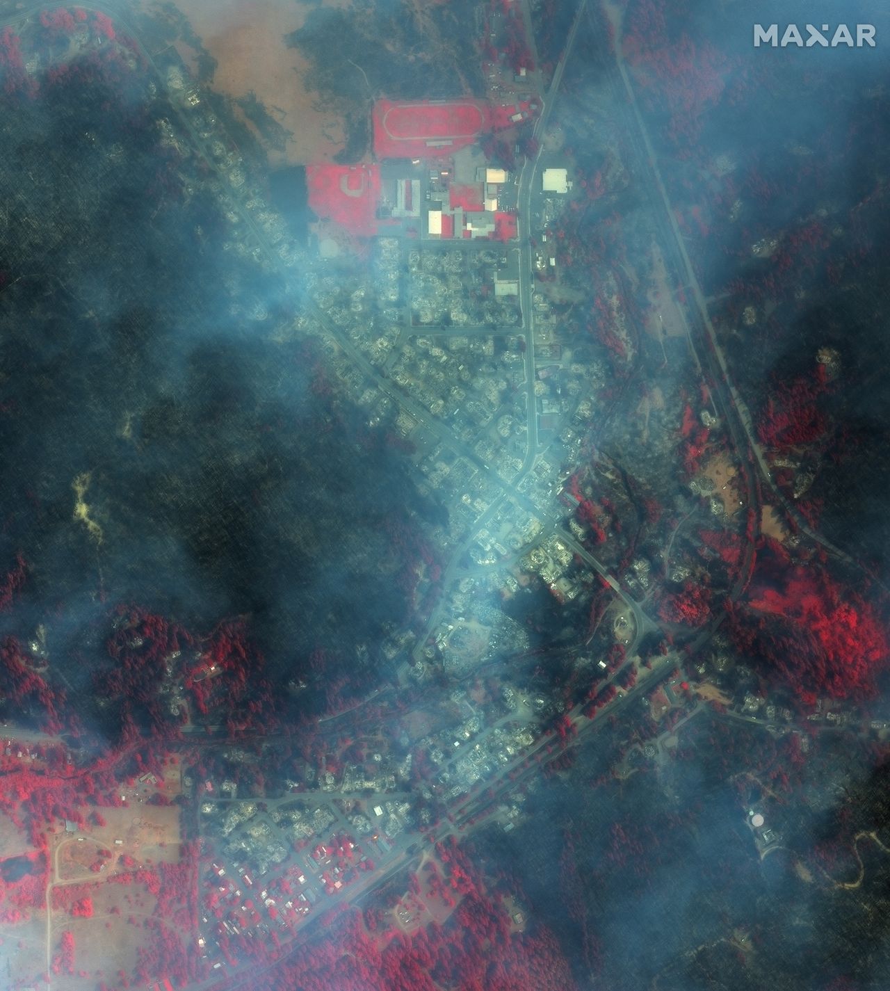 Before-and-after photos from Maxar's Worldview-1 satellite show the massive devastation of the California town Greenville by the Dixie Fire in August 2021.