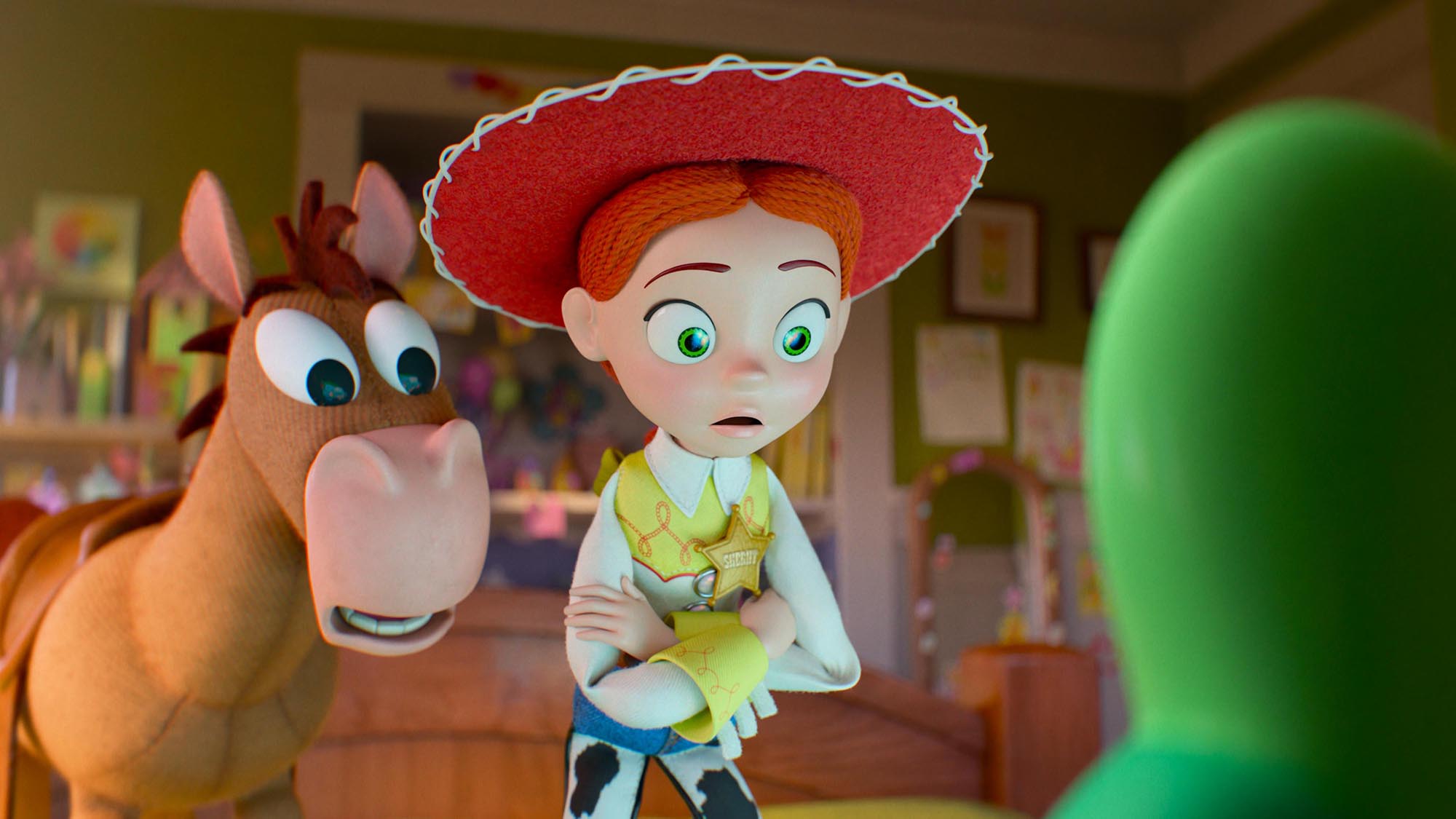 Bullseye and Jessie staring at Lilypad's screen in Toy Story 5