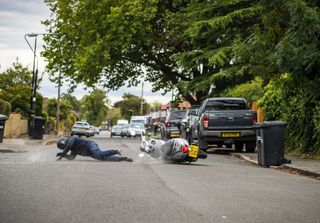 Stephen Reid crashes his bike,.