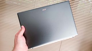Acer Swift 5 closed in hand