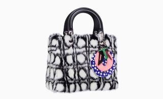 Daniel Gordon's Lady Dior bag features a rounded cannage pattern made of black and white inlaid mink, with multicolour reinterpreted Dior charms