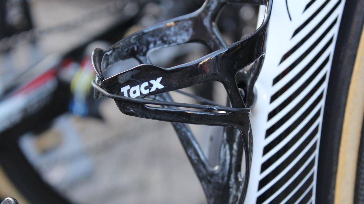 Grip tape is insurance on the cages &mdash; and the rubber band is back-up insurance on the grip tape