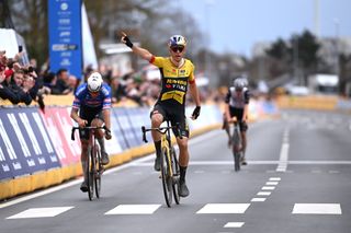 HARELBEKE BELGIUM MARCH 24 Wout Van Aert of Belgium and Team JumboVisma celebrates at finish line as race winner ahead of Mathieu Van Der Poel of The Netherlands and Team AlpecinDeceuninck and Tadej Pogaar of Slovenia and UAE Team Emirates during the 66th E3 Saxo Bank Classic Harelbeke 2023 a 2041km one day race from Harelbeke to Harelbeke on UCIWT March 24 2023 in Harelbeke Belgium Photo by Tim de WaeleGetty Images