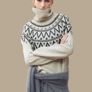 flat lay image of woman wearing fair isle jumper