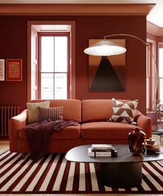 red living room with large floor lamp