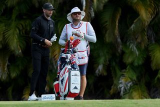 Ben Silverman chats to his caddie during the Puerto Rico Open