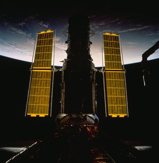 The Hubble Space Telescope seen with brand new solar arrays after the 1993 servicing mission.