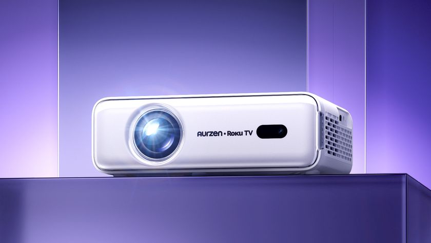 Aurzen D1R Roku smart projector on stand with purple background