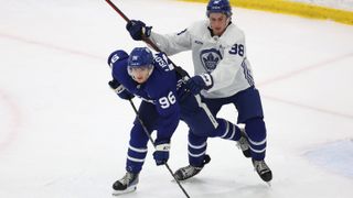 The Toronto Maple Leafs first round draft pick in the 2024 NHL player entry draft checks Brandon Lisowsky as the Toronto Maple Leafs host their 2024 development camp at Ford Performance Centre in Toronto.