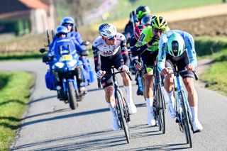 UAE Team Emirates' Belgian rider Tim Wellens (C) competes during the Kuurne-Brussels-Kuurne one day cycling race, 196,9 km from Kuurne to Kuurne via Brussels, in Kortrijk on March 2, 2025. (Photo by DIRK WAEM / Belga / AFP) / Belgium OUT