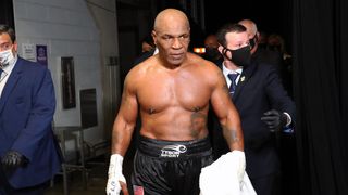 Mike Tyson exits the ring after receiving a split draw against Roy Jones Jr. during Mike Tyson vs Roy Jones Jr. presented by Triller at Staples Center on November 28, 2020 in Los Angeles, California.