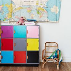 children bedroom with colourful locker and wooden flooring 