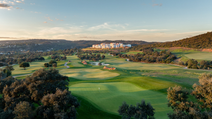 A wide shot of the Viceroy at Ombria's golf course, landscape and the resort buildings
