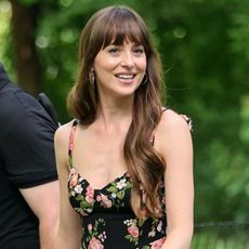 Dakota Johnson wears a sleeveless floral dress