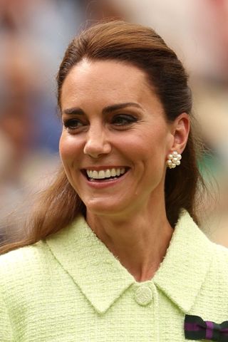 Kate Middleton headshot with a half up straight hairstyle