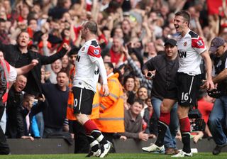 Wayne Rooney celebrates scoring his side’s third goal of the game and his hat-trick