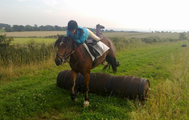 &ldquo;This is a picture of mine and Vinnie&rsquo;s first ever day out on a cross-country course. This was when he was only four and had just started jumping. After a day of perfect behaviour and jumping this happened at the last fence. I have a whole selection of pictures showing this near miss! I&rsquo;d like to think we&rsquo;ve improved since then&hellip;maybe! But now we stick to dressage&rdquo; &mdash; Allicia Corry