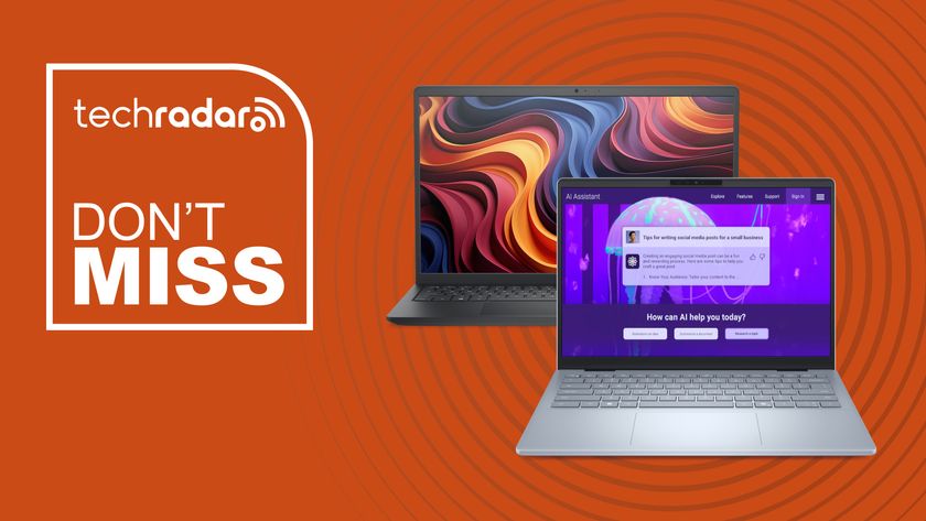 Two Dell laptops on an orange background