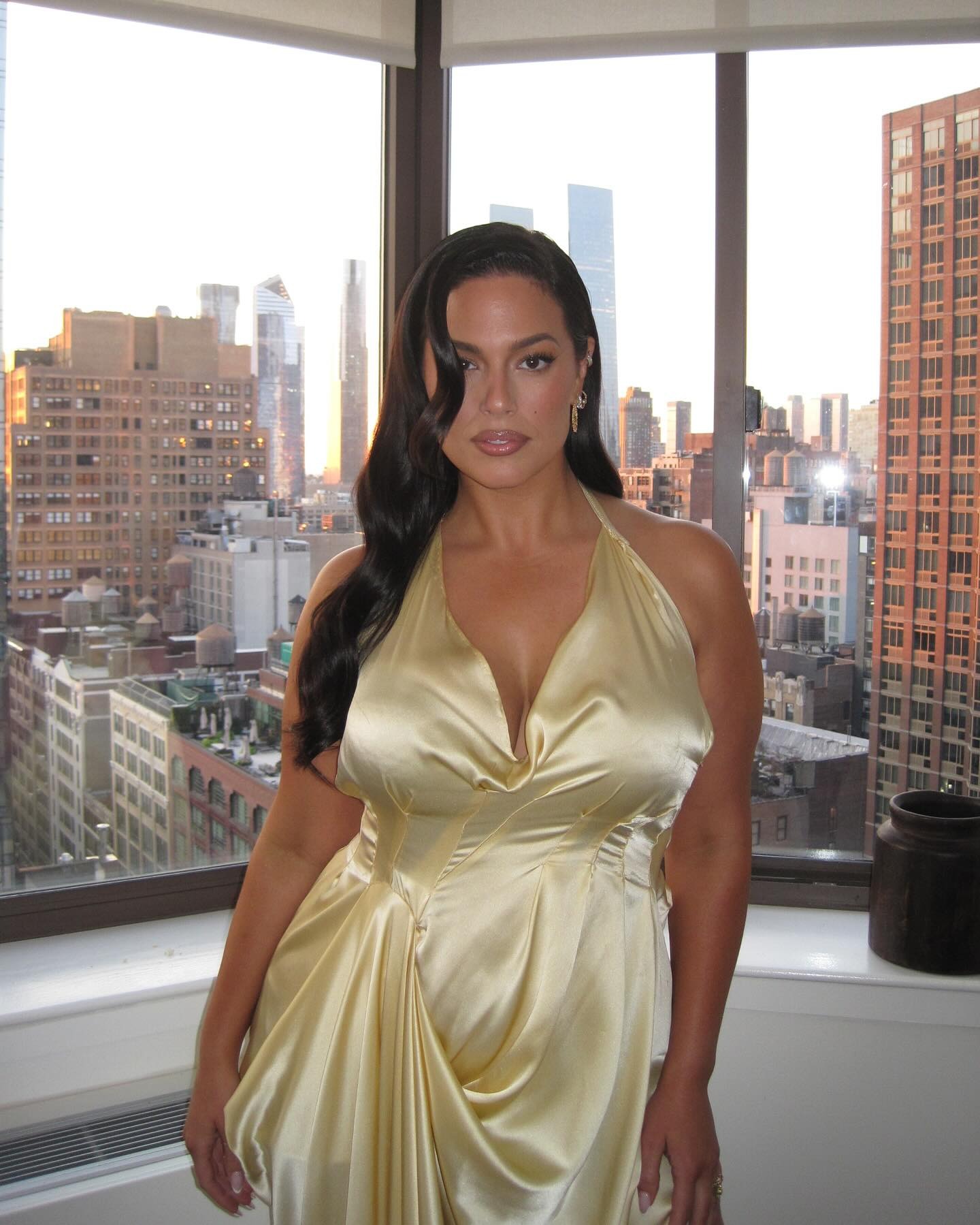Ashley Graham wearing yellow dress