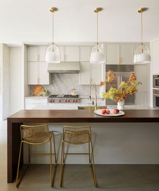 White kitchen with sleek island