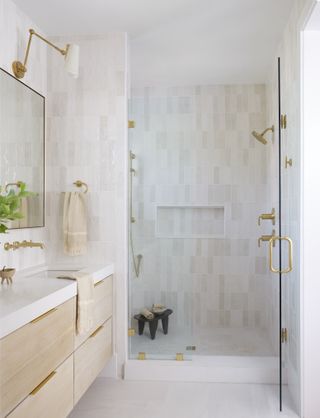 Bathroom with shower and vanity with basin with neutral decor