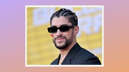Bad Bunny wears black sunglasses and a black suit as he attends the Los Angeles Premiere of Columbia Pictures' "Bullet Train" at Regency Village Theatre on August 01, 2022 in Los Angeles, California/ in a purple and orange gradient template