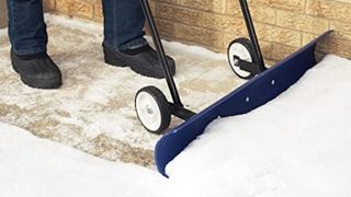 The Snowcaster 30SNC 36-inch Bi-Directional Wheeled Snow Shovel Pusher