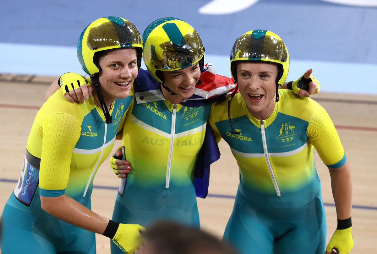 Ashlee Ankudinoff, Amy Cure and Annette Edmondson (Australia) celebrate Cure's scratch race win