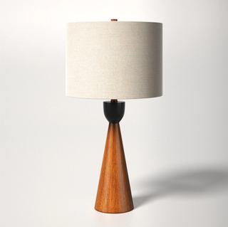 Wood base table lamp.