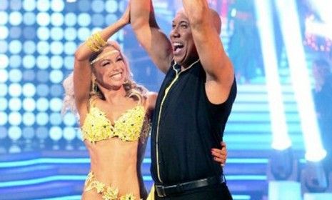 &amp;quot;Dancing With The Stars&amp;quot; winners Hines Ward his partner Kym Johnson celebrate Tuesday night: The 12th season averaged 22.5 million viewers, and increase from last year.