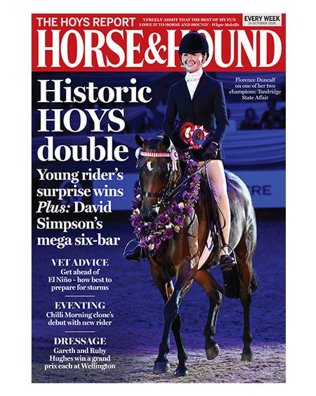 Horse & Hound magazine cover featuring the winning show pony at Horse of the Year Show 2026 wearing a sashof flowers ridden by a young lady wearing a navy jacket and white stock