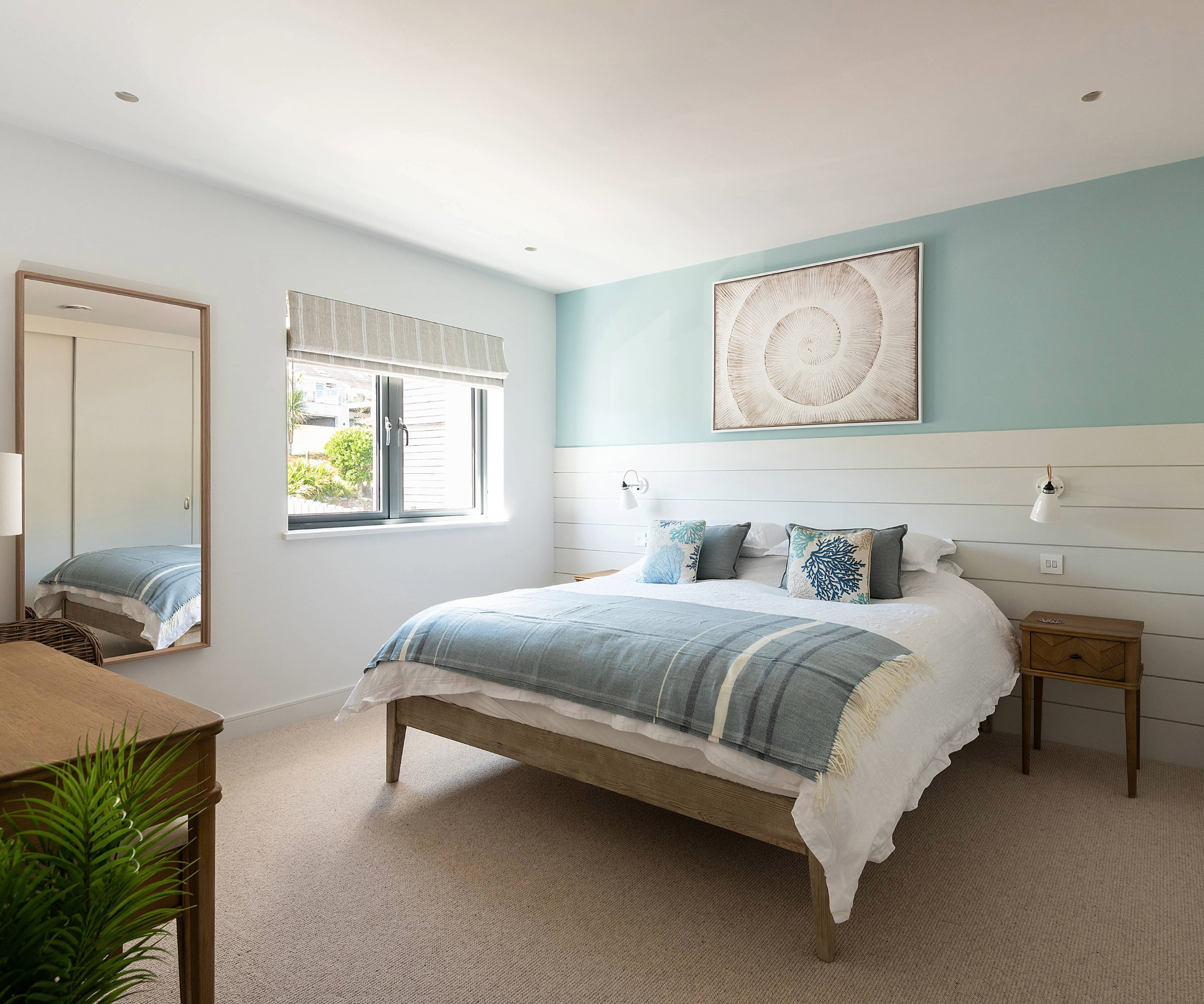 Bedroom with blue and white colour scheme