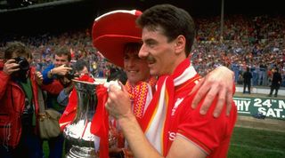 Ian Rush and Kenny Dalglish celebrate with the FA Cup after Liverpool's win over Everton in the 1986 final at Wembley.