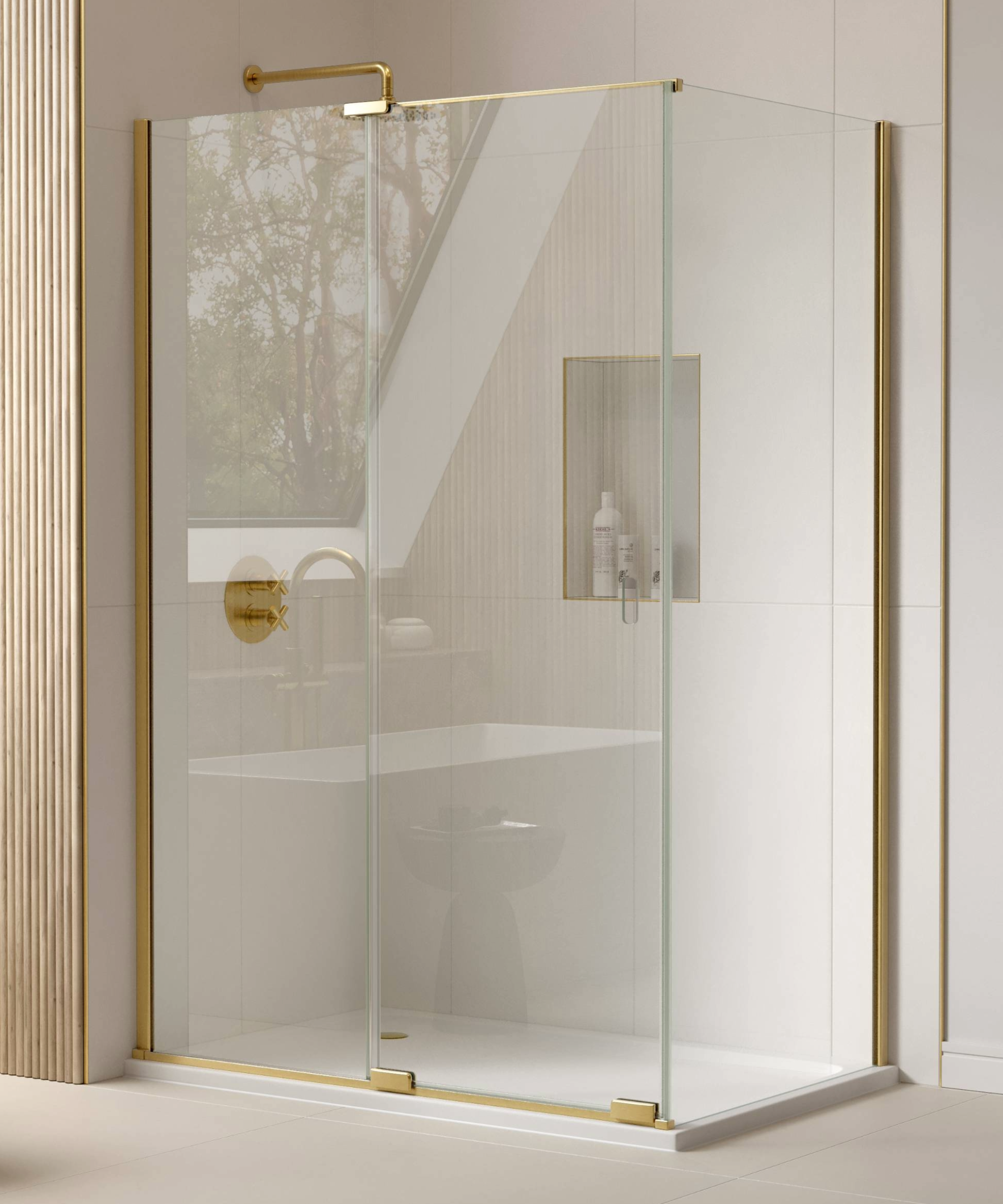 Frameless shower enclosure with gold trim and shower head