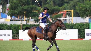 Prince Harry playing polo