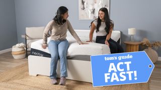 Two women sit on the Nectar Luxe Memory Foam Mattress in a bedroom, a Tom's Guide Act Fast deals graphic (right)