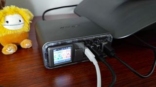 Acefast Desktop Powerstation Z4 with cables connected to USB ports