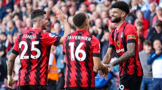 Philip Billing of Bournemouth is congratulated by team-mates Marcos Senesi and Marcus Tavernier after he scores a goal to make it 1-1 during the Premier League match between AFC Bournemouth and Leicester City at Vitality Stadium on October 08, 2022 in Bournemouth, England.