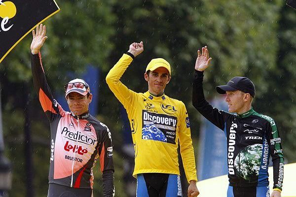 Podium wavers Evans, Contador, Leipheimer (l-r)