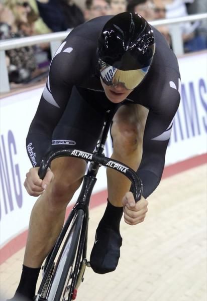Kiwi Shane Archbold winds it up for the flying lap