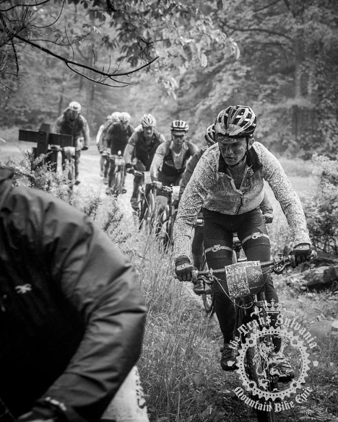 Gunnar Bergey mid-pack into the singletrack of stage 3.