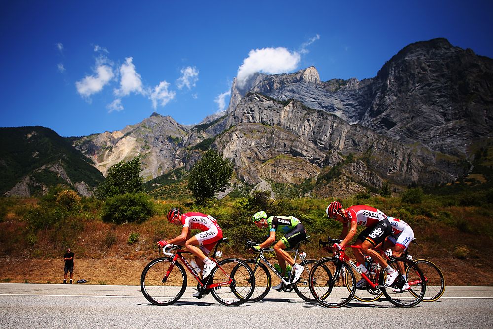 The day's breakaway: Nicolas Edet of France and Cofidis, Ramunas Navardauskas of Lithuania and Team Cannondale-Garmin, Lars Bak of Denmark and Lotto-Soudal and Alexandre Geniez of France and FDJ