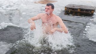 Swim in the ice hole at the baptism of the Lord