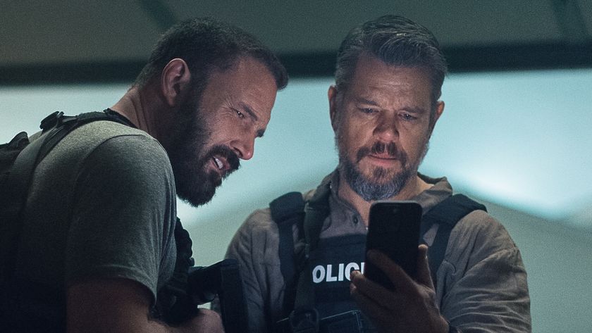 Dane and DJ looking at phone in The Rip