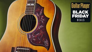 A photo of the Epiphone Inspired by Gibson Hummingbird in Aged Natural Antique Finish