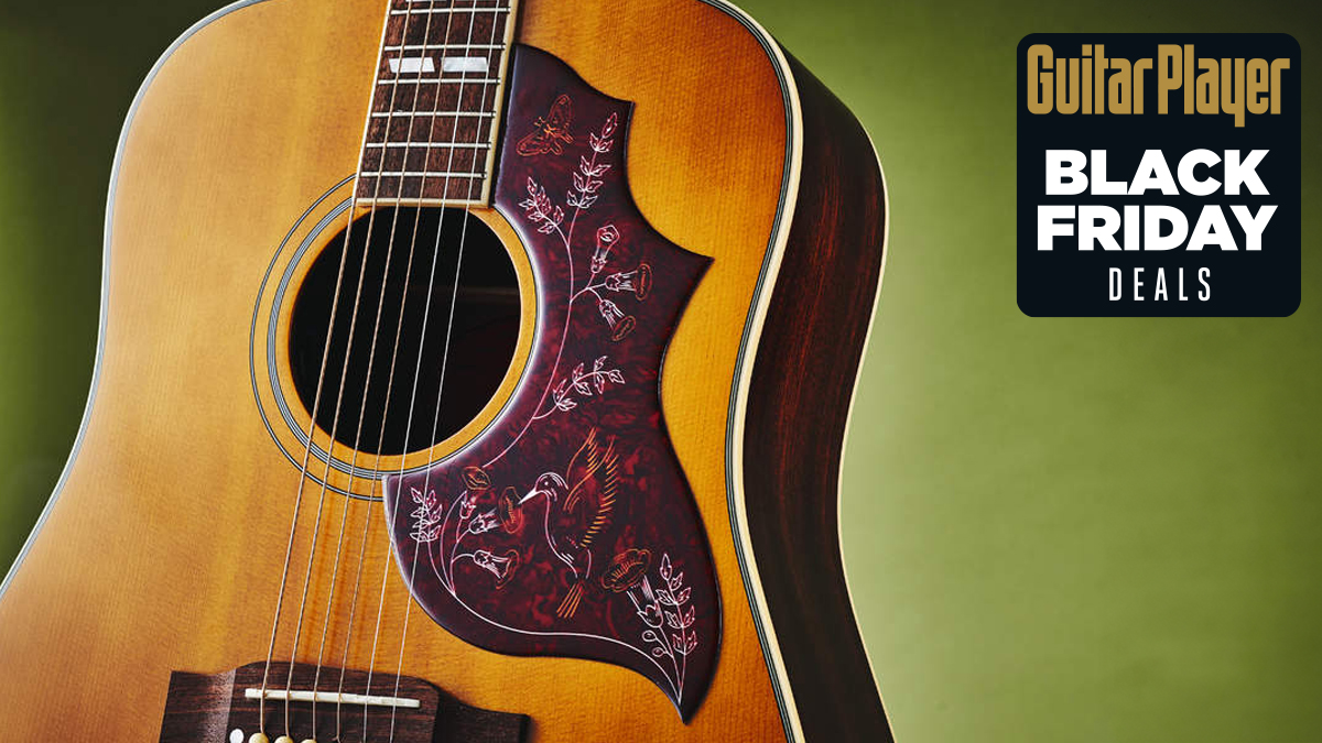 A photo of the Epiphone Inspired by Gibson Hummingbird in Aged Natural Antique Finish