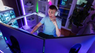 Teenager intrigued while playing video games at night in a vibrant room